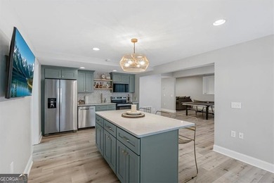 This stunning luxury home at 4027 Hickory Fairway Drive on The Golf Club At Bradshaw Farm in Georgia - for sale on GolfHomes.com, golf home, golf lot