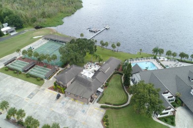 Welcome to your dream home! This spacious gem is perfect for on Lake Henry Golf Club in Florida - for sale on GolfHomes.com, golf home, golf lot