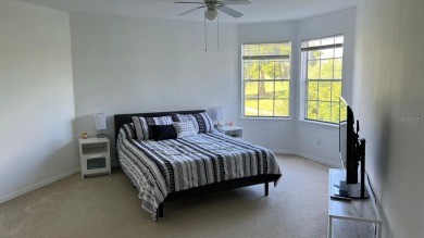 This meticulously maintained 2-bedroom, 2-bathroom apartment on MetroWest Golf Club in Florida - for sale on GolfHomes.com, golf home, golf lot