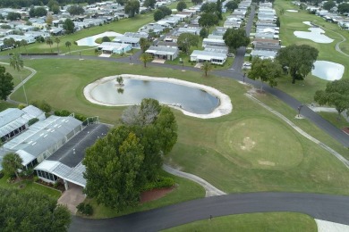 Welcome to your dream home! This spacious gem is perfect for on Lake Henry Golf Club in Florida - for sale on GolfHomes.com, golf home, golf lot