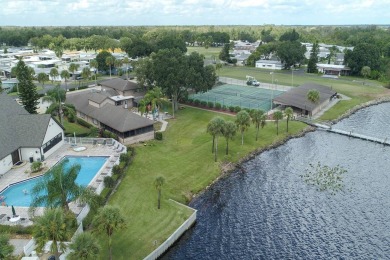 Welcome to your dream home! This spacious gem is perfect for on Lake Henry Golf Club in Florida - for sale on GolfHomes.com, golf home, golf lot