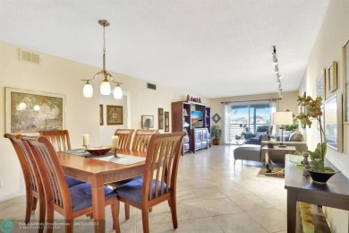 WELL CARED FOR 2/2 ON THE GOLF COURSE W/ LOVELY LAKE VIEW! on Wynmoor Golf Course in Florida - for sale on GolfHomes.com, golf home, golf lot
