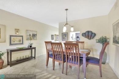 WELL CARED FOR 2/2 ON THE GOLF COURSE W/ LOVELY LAKE VIEW! on Wynmoor Golf Course in Florida - for sale on GolfHomes.com, golf home, golf lot