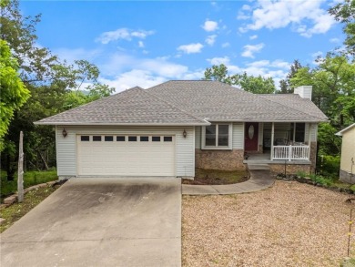 Surrounded by the natural beauty of Holiday Island, this 3 bed on Holiday Island Executive Golf Course in Arkansas - for sale on GolfHomes.com, golf home, golf lot