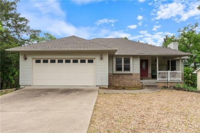 Surrounded by the natural beauty of Holiday Island, this 3 bed on Holiday Island Executive Golf Course in Arkansas - for sale on GolfHomes.com, golf home, golf lot