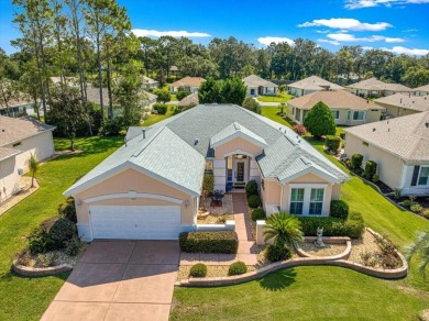 Discover this well-maintained 2 bedroom, 2 bath home plus a den on Eagle Ridge At Spruce Creek Country Club in Florida - for sale on GolfHomes.com, golf home, golf lot