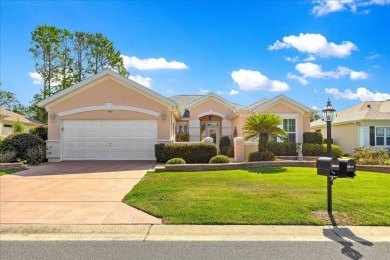 Discover this well-maintained 2 bedroom, 2 bath home plus a den on Eagle Ridge At Spruce Creek Country Club in Florida - for sale on GolfHomes.com, golf home, golf lot