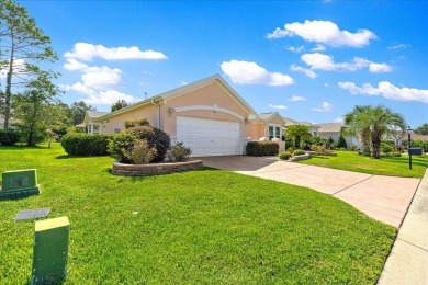 Discover this well-maintained 2 bedroom, 2 bath home plus a den on Eagle Ridge At Spruce Creek Country Club in Florida - for sale on GolfHomes.com, golf home, golf lot