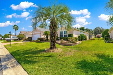 Discover this well-maintained 2 bedroom, 2 bath home plus a den on Eagle Ridge At Spruce Creek Country Club in Florida - for sale on GolfHomes.com, golf home, golf lot