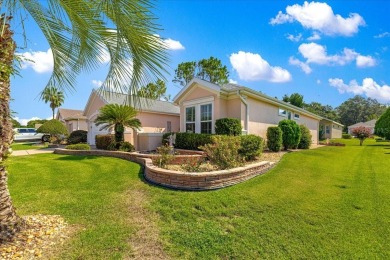 Discover this well-maintained 2 bedroom, 2 bath home plus a den on Eagle Ridge At Spruce Creek Country Club in Florida - for sale on GolfHomes.com, golf home, golf lot