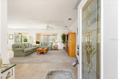 Discover this well-maintained 2 bedroom, 2 bath home plus a den on Eagle Ridge At Spruce Creek Country Club in Florida - for sale on GolfHomes.com, golf home, golf lot