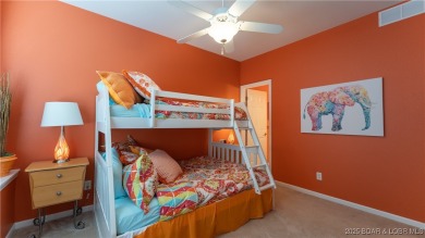 Welcome to your lakeside haven at Palisades Condominiums on Tan-Tar-A Golf Club in Missouri - for sale on GolfHomes.com, golf home, golf lot