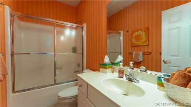 Welcome to your lakeside haven at Palisades Condominiums on Tan-Tar-A Golf Club in Missouri - for sale on GolfHomes.com, golf home, golf lot