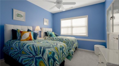 Welcome to your lakeside haven at Palisades Condominiums on Tan-Tar-A Golf Club in Missouri - for sale on GolfHomes.com, golf home, golf lot