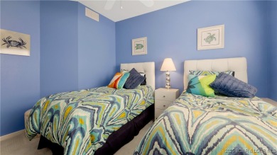 Welcome to your lakeside haven at Palisades Condominiums on Tan-Tar-A Golf Club in Missouri - for sale on GolfHomes.com, golf home, golf lot