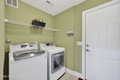 Nestled in the prestigious Castle Bay golf community of on Castle Bay Golf and Country Club in North Carolina - for sale on GolfHomes.com, golf home, golf lot