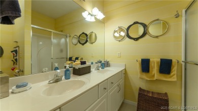 Welcome to your lakeside haven at Palisades Condominiums on Tan-Tar-A Golf Club in Missouri - for sale on GolfHomes.com, golf home, golf lot