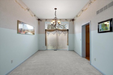 4 BR 3.5 bath Expanded ''Newport'' Colonial that's in pristine on Pheasant Run Golf Club in Michigan - for sale on GolfHomes.com, golf home, golf lot