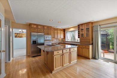 4 BR 3.5 bath Expanded ''Newport'' Colonial that's in pristine on Pheasant Run Golf Club in Michigan - for sale on GolfHomes.com, golf home, golf lot