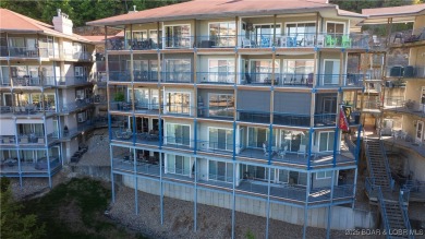 Welcome to your lakeside haven at Palisades Condominiums on Tan-Tar-A Golf Club in Missouri - for sale on GolfHomes.com, golf home, golf lot