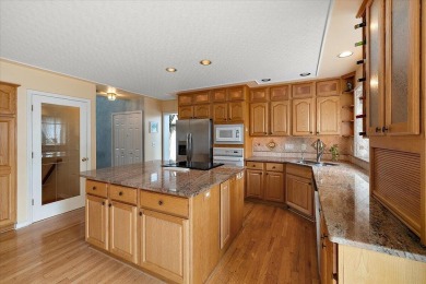 4 BR 3.5 bath Expanded ''Newport'' Colonial that's in pristine on Pheasant Run Golf Club in Michigan - for sale on GolfHomes.com, golf home, golf lot