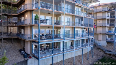 Welcome to your lakeside haven at Palisades Condominiums on Tan-Tar-A Golf Club in Missouri - for sale on GolfHomes.com, golf home, golf lot