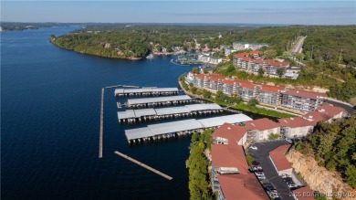 Welcome to your lakeside haven at Palisades Condominiums on Tan-Tar-A Golf Club in Missouri - for sale on GolfHomes.com, golf home, golf lot