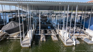 Welcome to your lakeside haven at Palisades Condominiums on Tan-Tar-A Golf Club in Missouri - for sale on GolfHomes.com, golf home, golf lot