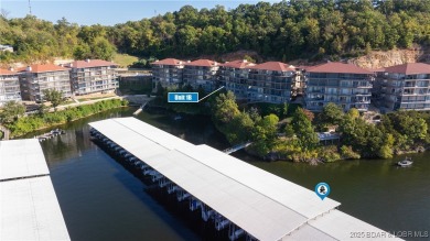 Welcome to your lakeside haven at Palisades Condominiums on Tan-Tar-A Golf Club in Missouri - for sale on GolfHomes.com, golf home, golf lot