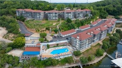 Welcome to your lakeside haven at Palisades Condominiums on Tan-Tar-A Golf Club in Missouri - for sale on GolfHomes.com, golf home, golf lot