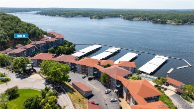 Welcome to your lakeside haven at Palisades Condominiums on Tan-Tar-A Golf Club in Missouri - for sale on GolfHomes.com, golf home, golf lot