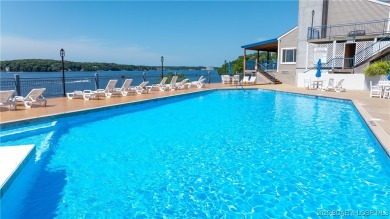 Welcome to your lakeside haven at Palisades Condominiums on Tan-Tar-A Golf Club in Missouri - for sale on GolfHomes.com, golf home, golf lot