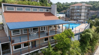 Welcome to your lakeside haven at Palisades Condominiums on Tan-Tar-A Golf Club in Missouri - for sale on GolfHomes.com, golf home, golf lot