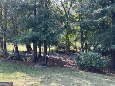 Welcome to this beautifully maintained 3-bedroom, 2-bathroom on Braelinn Golf Club in Georgia - for sale on GolfHomes.com, golf home, golf lot