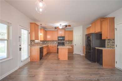 Welcome to your dream home in a beautiful gated community with on Carolina Lakes Country Club in North Carolina - for sale on GolfHomes.com, golf home, golf lot