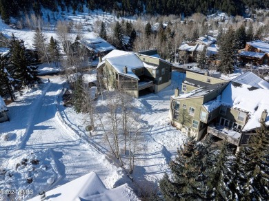 Spacious, updated townhome situated on the 11th tee box of the on Eagle Vail Golf Course in Colorado - for sale on GolfHomes.com, golf home, golf lot