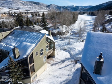 Spacious, updated townhome situated on the 11th tee box of the on Eagle Vail Golf Course in Colorado - for sale on GolfHomes.com, golf home, golf lot