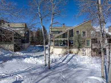 Spacious, updated townhome situated on the 11th tee box of the on Eagle Vail Golf Course in Colorado - for sale on GolfHomes.com, golf home, golf lot