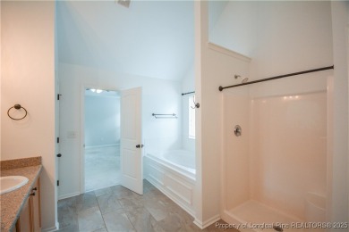 Welcome to your dream home in a beautiful gated community with on Carolina Lakes Country Club in North Carolina - for sale on GolfHomes.com, golf home, golf lot