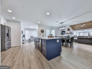 Wake up to breathtaking lake views, glowing sunrises, and on The Highlands Course at Lake Arrowhead in Georgia - for sale on GolfHomes.com, golf home, golf lot