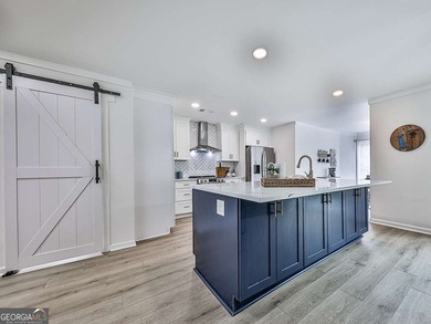 Wake up to breathtaking lake views, glowing sunrises, and on The Highlands Course at Lake Arrowhead in Georgia - for sale on GolfHomes.com, golf home, golf lot