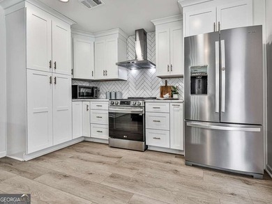 Wake up to breathtaking lake views, glowing sunrises, and on The Highlands Course at Lake Arrowhead in Georgia - for sale on GolfHomes.com, golf home, golf lot