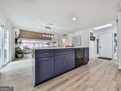 Wake up to breathtaking lake views, glowing sunrises, and on The Highlands Course at Lake Arrowhead in Georgia - for sale on GolfHomes.com, golf home, golf lot