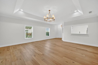 Stunning, Fully Renovated Golf Course Retreat!Located in one of on Gator Trace Golf and Country Club in Florida - for sale on GolfHomes.com, golf home, golf lot