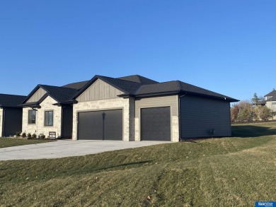 Custom designed by MK Builders, this brand new 4 bedroom, 3 bath on HiMark Golf Course in Nebraska - for sale on GolfHomes.com, golf home, golf lot