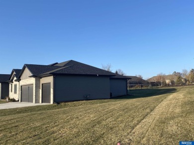 Custom designed by MK Builders, this brand new 4 bedroom, 3 bath on HiMark Golf Course in Nebraska - for sale on GolfHomes.com, golf home, golf lot