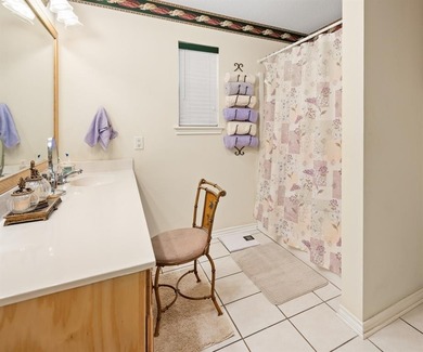 Tucked away on a beautifully wooded lot in the heart of East on Holly Lake Ranch Golf Club in Texas - for sale on GolfHomes.com, golf home, golf lot