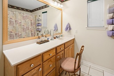 Tucked away on a beautifully wooded lot in the heart of East on Holly Lake Ranch Golf Club in Texas - for sale on GolfHomes.com, golf home, golf lot