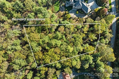 Discover a rare and exceptional opportunity to build your custom on Biltmore Forest Country Club in North Carolina - for sale on GolfHomes.com, golf home, golf lot