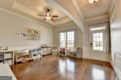 Rarely available primary-on-main floor bedroom plan in highly on Hampton Golf Village in Georgia - for sale on GolfHomes.com, golf home, golf lot